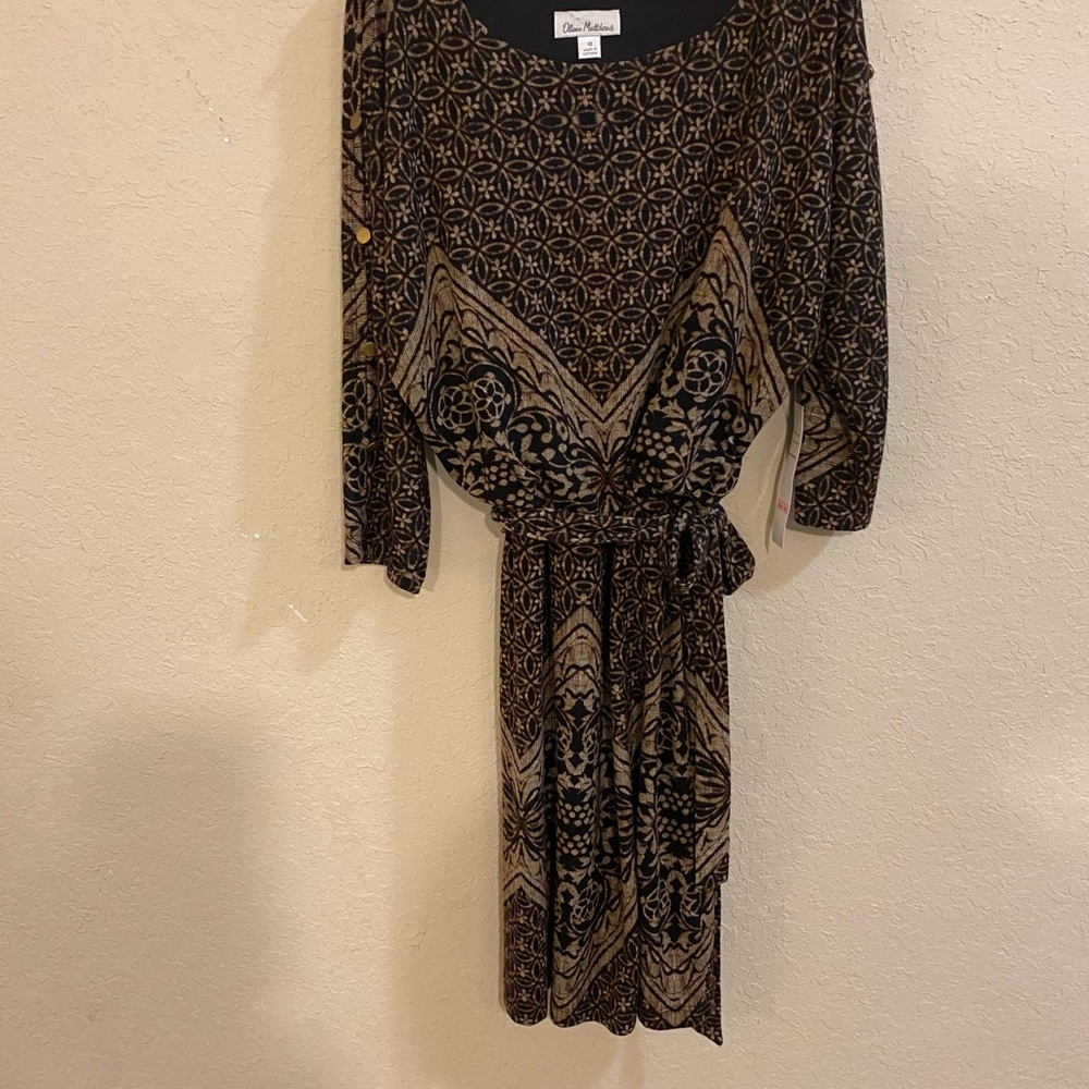Olivia Matthew’s casual dress. New with tags beautiful gold button accents.